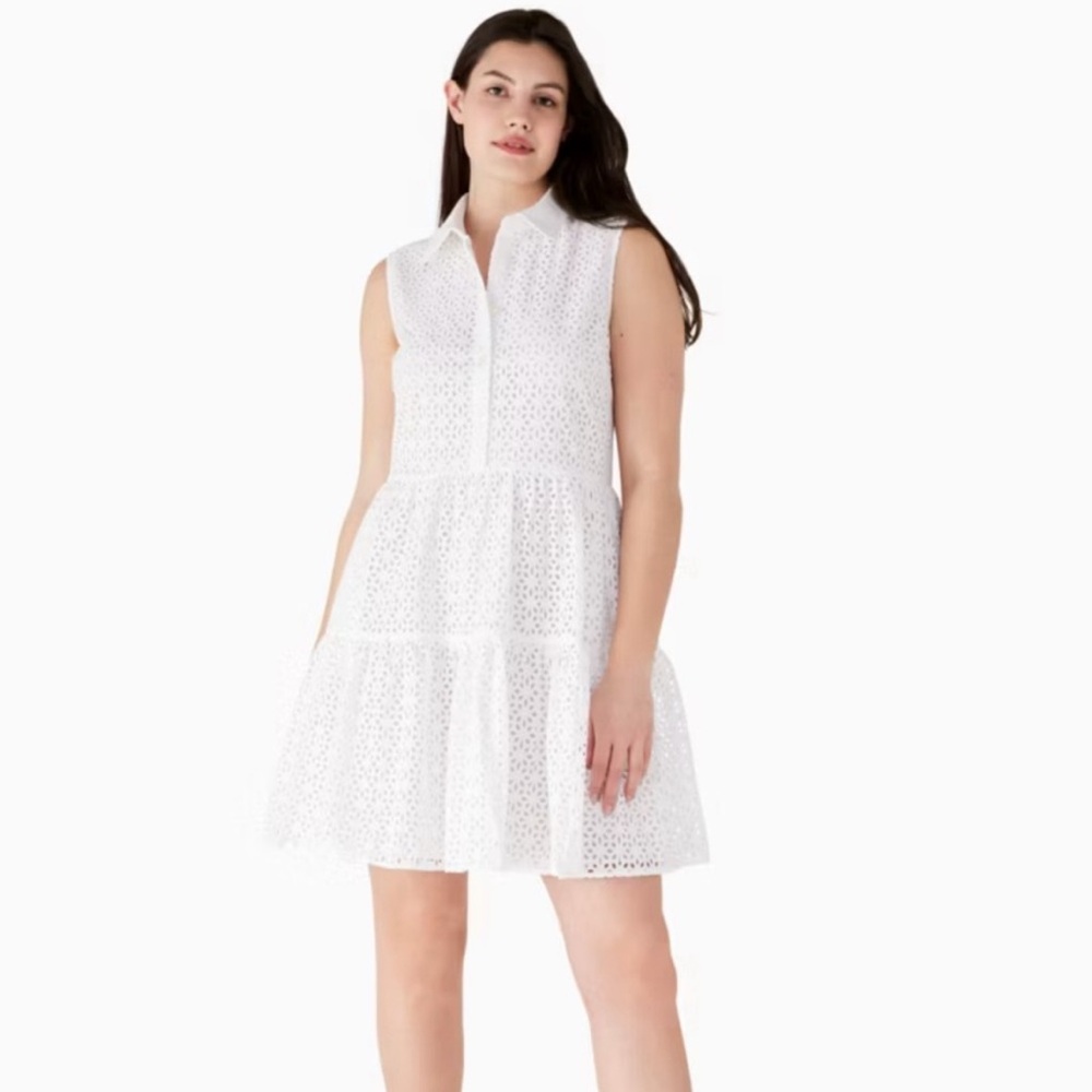 Kate Spade white eyelet shirt dress with ruffle skirts! 
Size L. Worn once